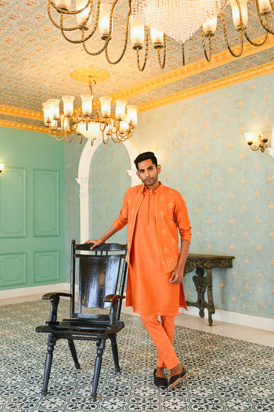 Orange embroidered bandi with kurta and bottom