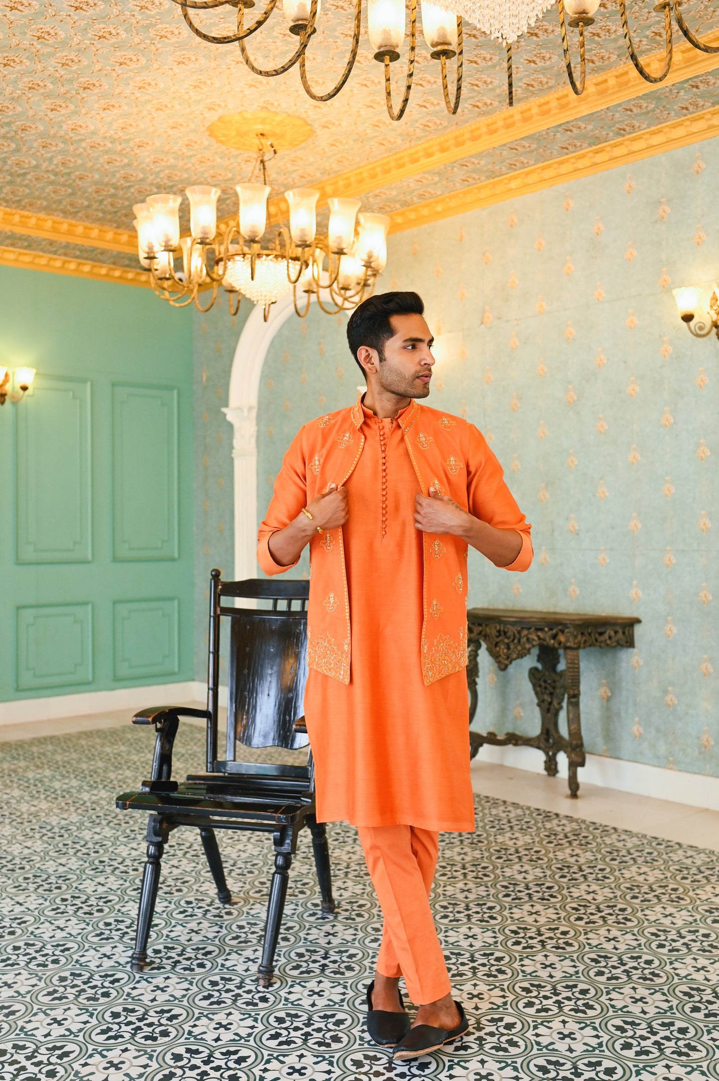 Orange embroidered bandi with kurta and bottom