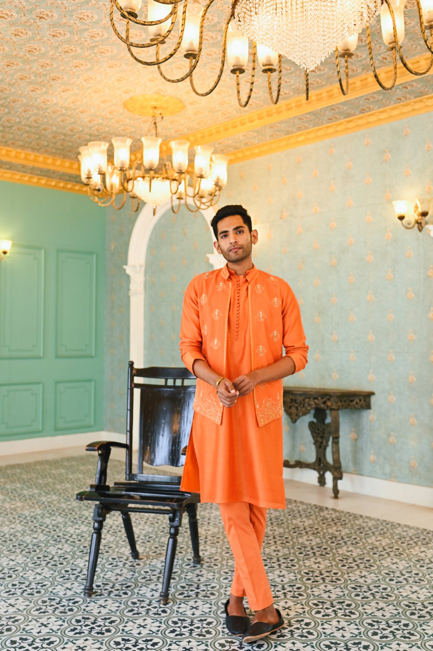 Orange embroidered bandi with kurta and bottom