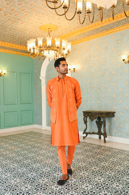 Orange embroidered bandi with kurta and bottom