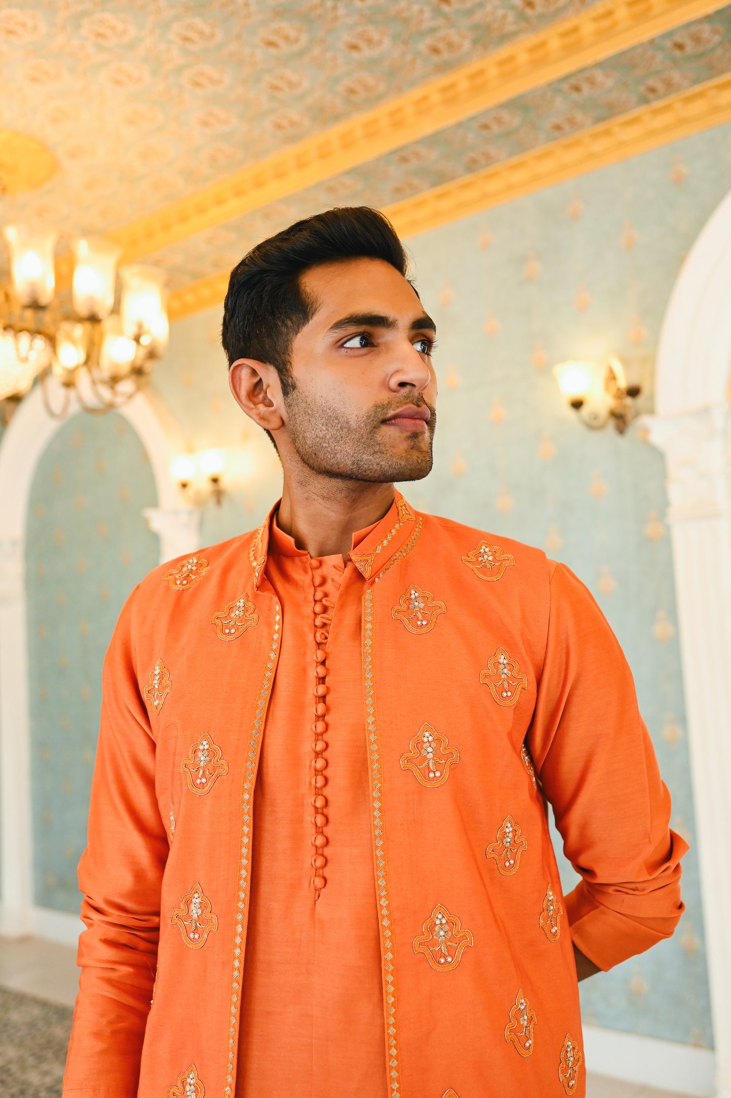 Orange embroidered bandi with kurta and bottom