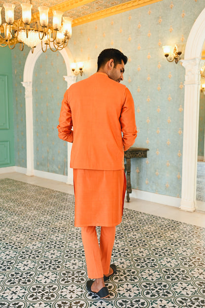 Orange embroidered bandi with kurta and bottom