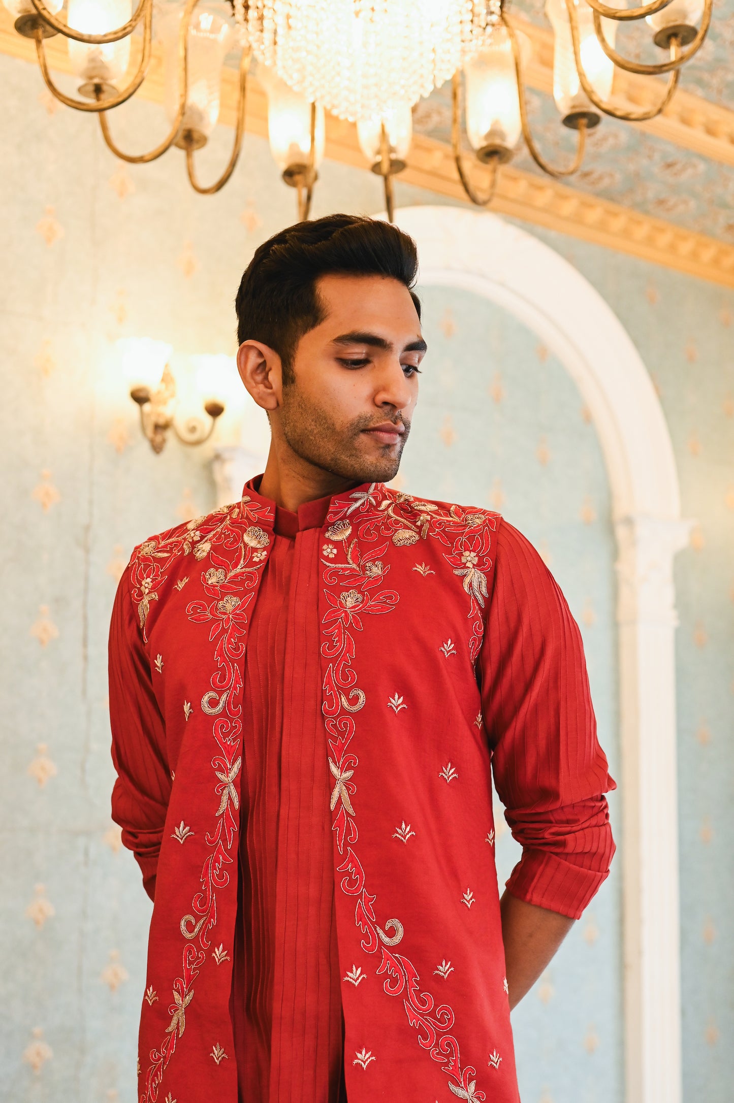 Red embroidered bandi with kurta and bottom