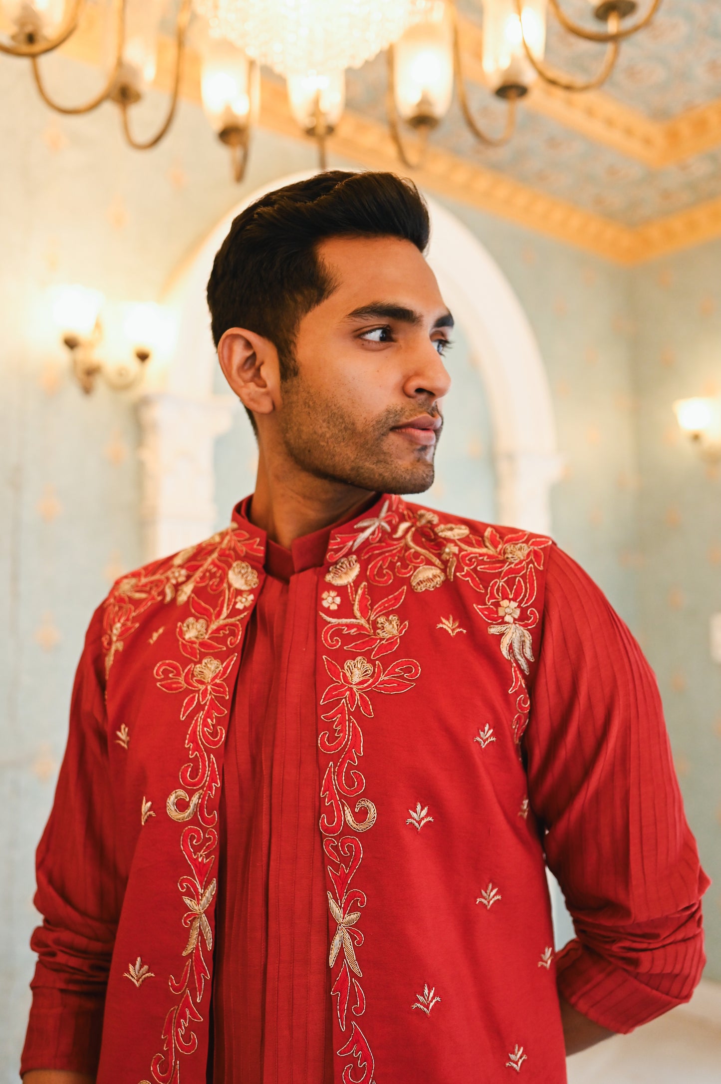 Red embroidered bandi with kurta and bottom