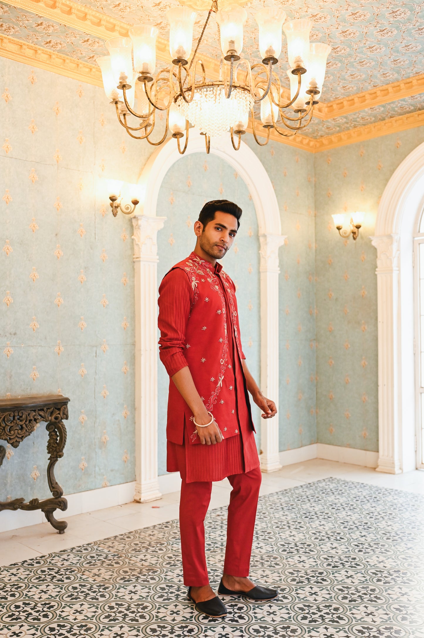 Red embroidered bandi with kurta and bottom