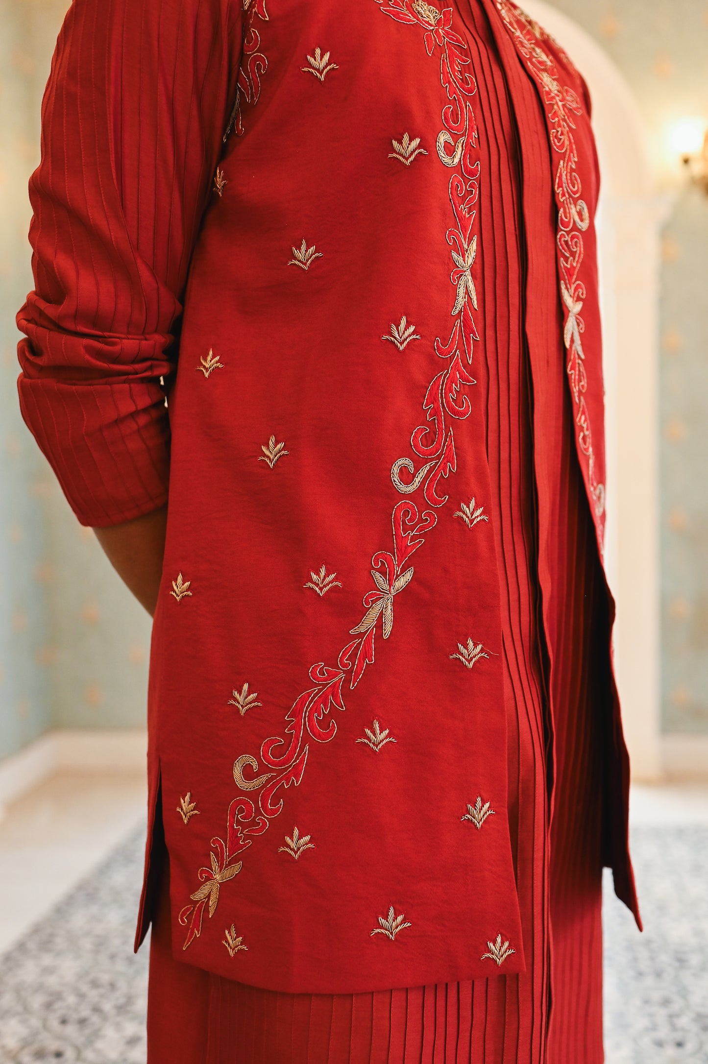 Red embroidered bandi with kurta and bottom